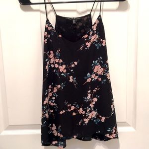 Black spaghetti strap with floral details. Size S